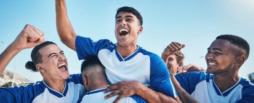 teammates cheer after a win